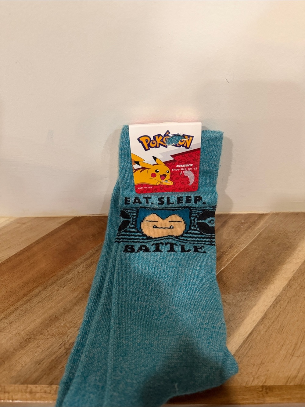 Pokemon Teal Snorlax 'Eat. Sleep. Battle.' Crew Socks